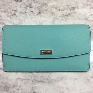 Free cosmetic bag w/purchase of Kate Spade wallet